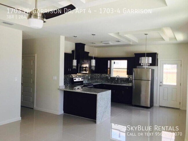 Building Photo - 1703 W Garrison Dr