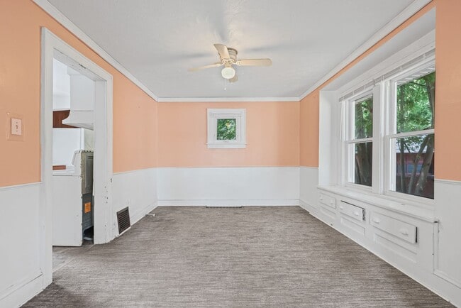 Building Photo - Bright living ? cozy dining flow for everyday comfort and easy entertaining.