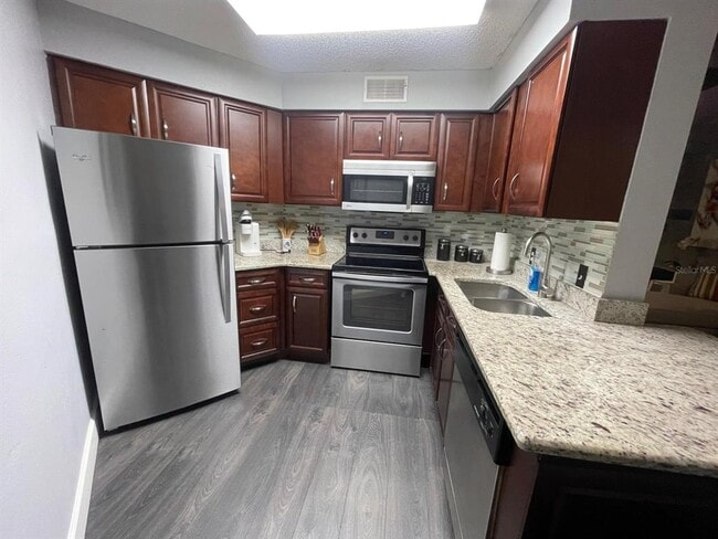 Building Photo - 3699 Atrium Dr