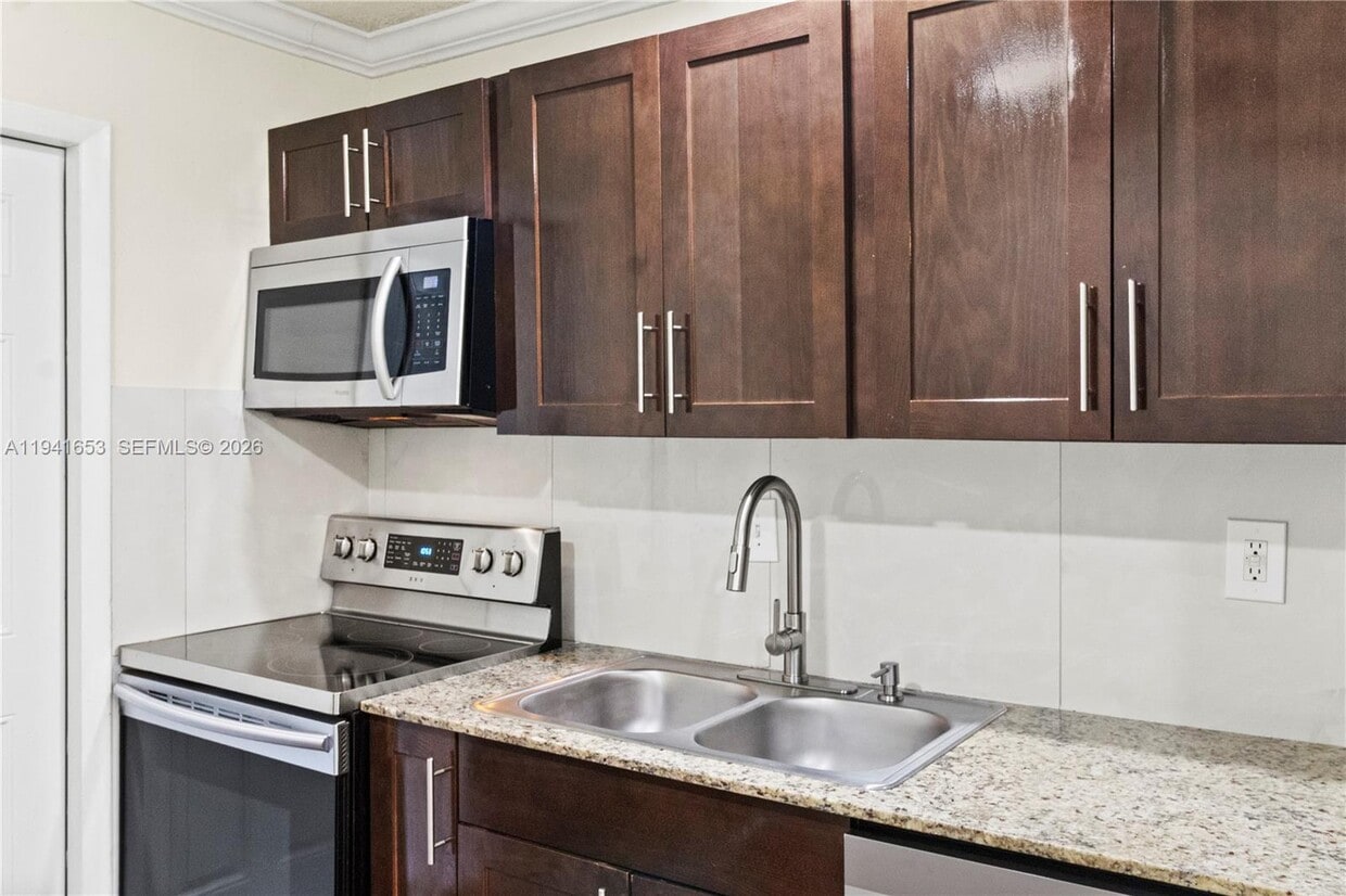 Photo - 441 Northeast 30th Street, Pompano Beach, FL 33064 - 2 BR 1 BA multi-family home