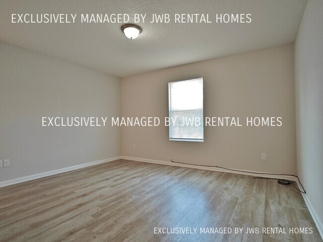 Building Photo - 8472 McGirts Village Ln