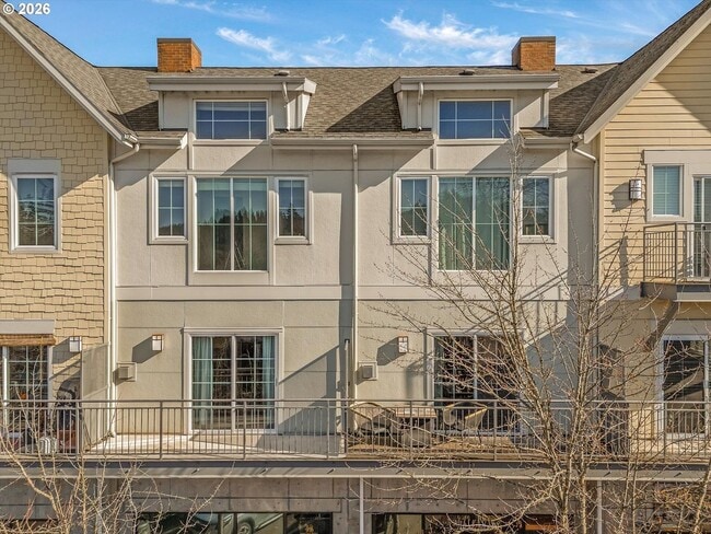 Building Photo - Main Street Living with Granite Kitchen, Gas Fireplace, and MAX Line Access