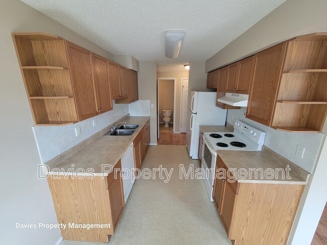 Building Photo - 7115-7180 80 Ave NW