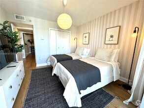 Building Photo - 5555 Collins Ave