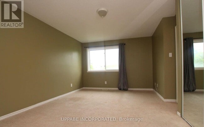 Photo du bâtiment - 6075 Pineglade Crescent