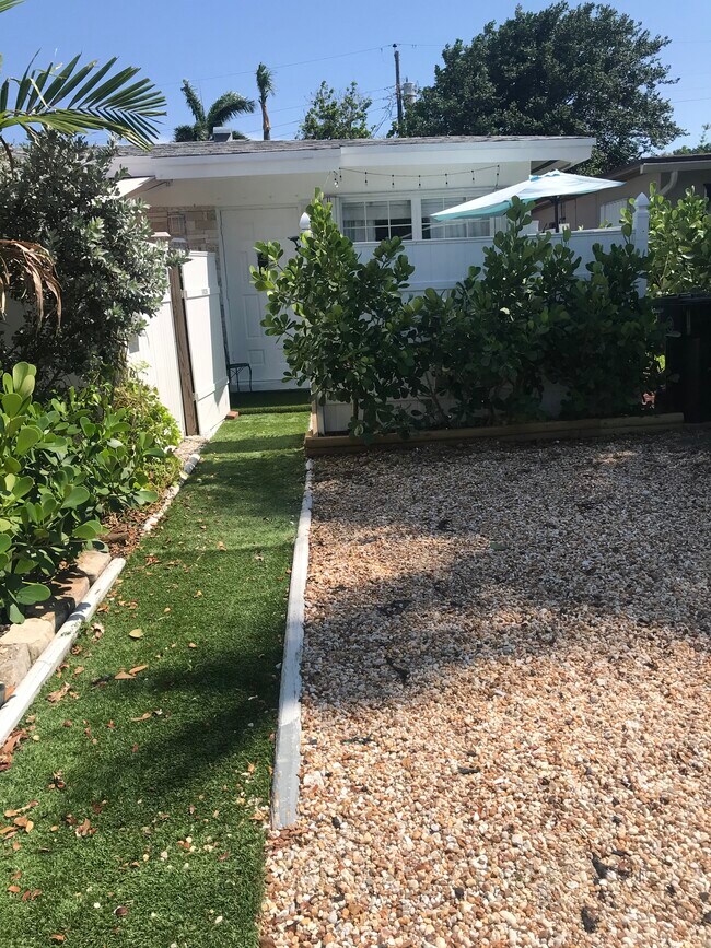 walkway up from your private driveway and front patio - 1326 NE 14th Pl
