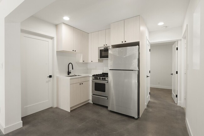 Kitchen from SE corner of main room - 245 Market St