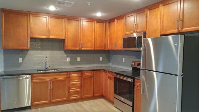 Building Photo - The Community Apartments Senior Living 55+
