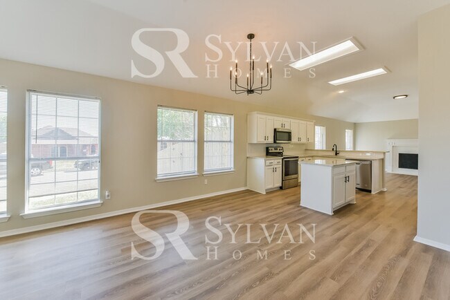 Building Photo - Updated 4 bedroom home with garage!