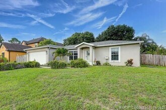 Building Photo - 6250 NW Hacienda Ln