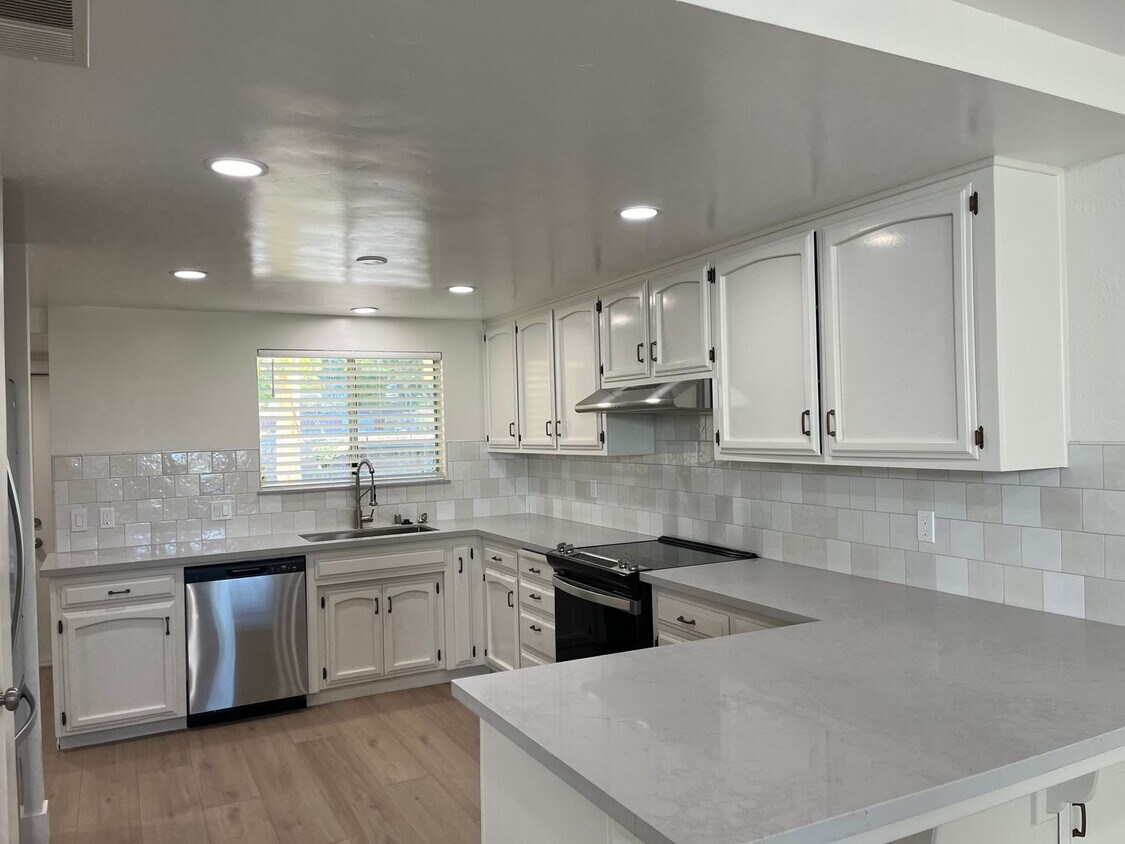 Primary Photo - Updated 2 story Condo in Central Location ...