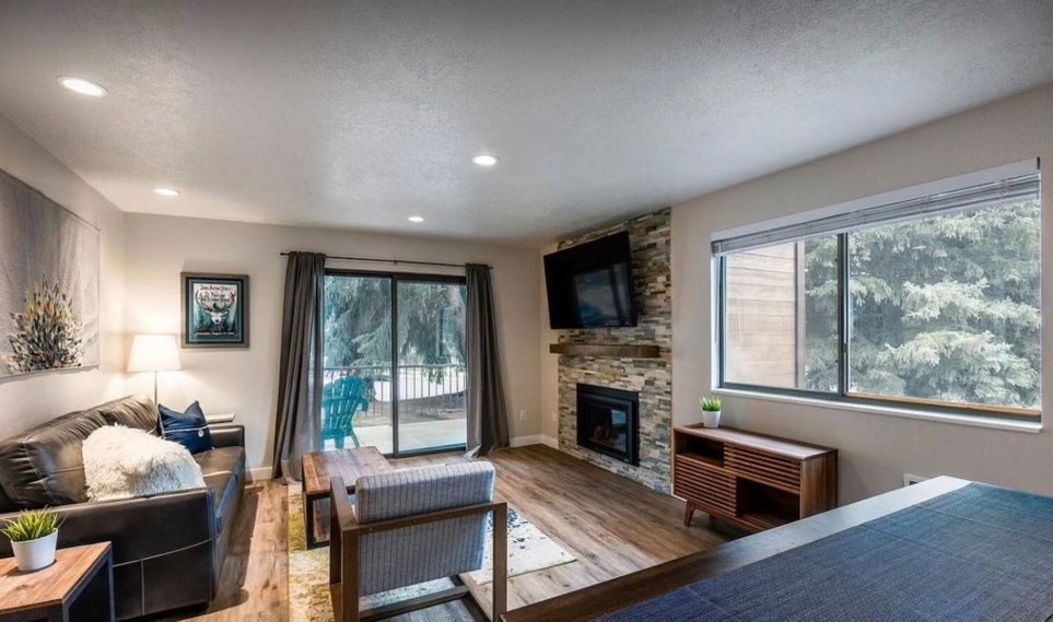 Living room, gas fireplace, deck - 2025 Canyons Resort Dr