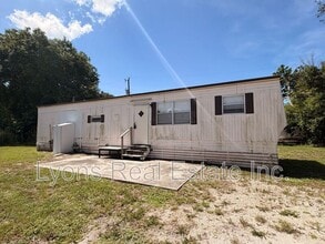 Building Photo - 7869 Suncoast Dr