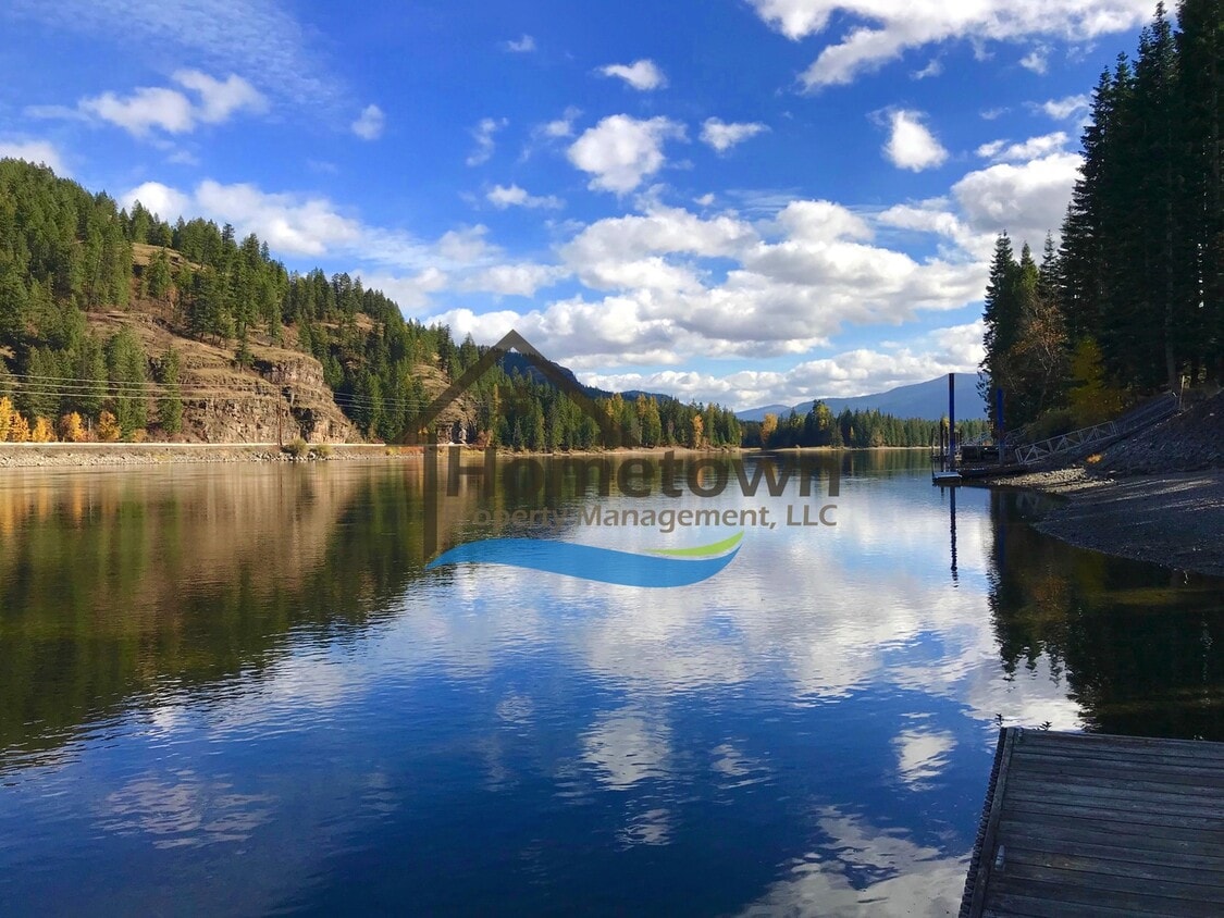 Primary Photo - Riverfront Home on .62 acre Lot with Dock ...