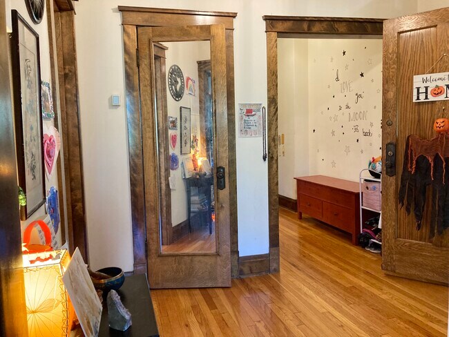 Entrance looking down hall - closet in middle and master bedroom to the left - 1415 W Cuyler Ave
