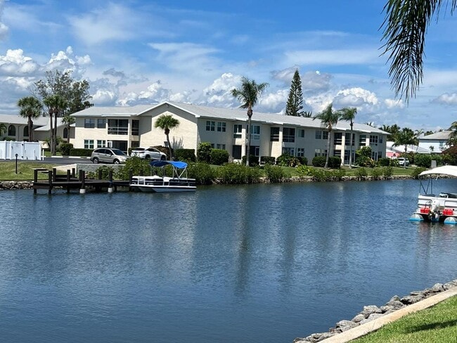 Rear of Condo (second floor) second from left - 1860 Robalo Dr