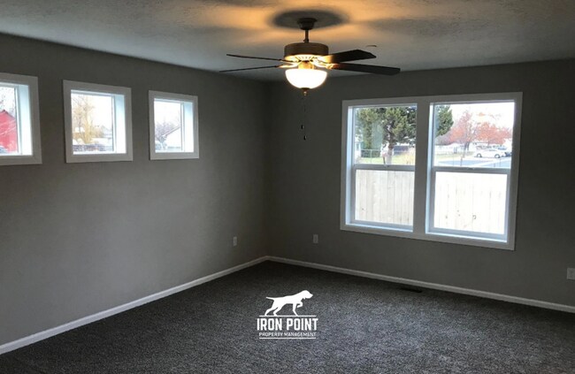 Building Photo - 3bed/2bath - Landscaping Included plus fenced yard, & two car garage.