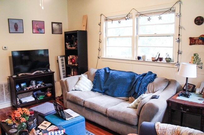 Bring your comfy couch to this nice-sized living room. - 1606 Sharkey St