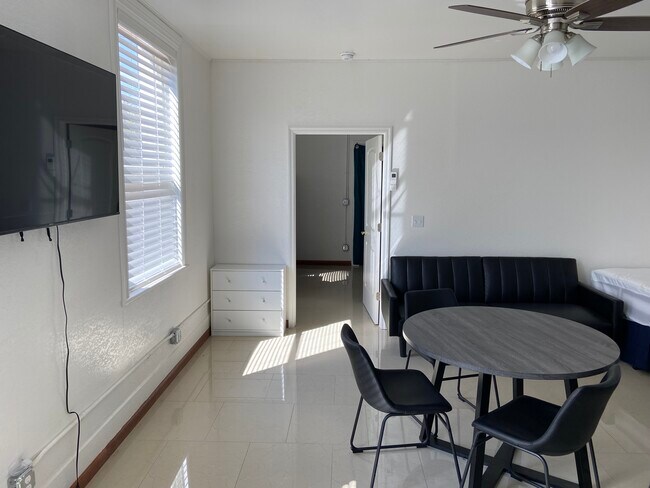 Living room different angle with th TV - 110 N 300 E