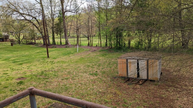 Backyard with view of a pond - 36 Montis Dr