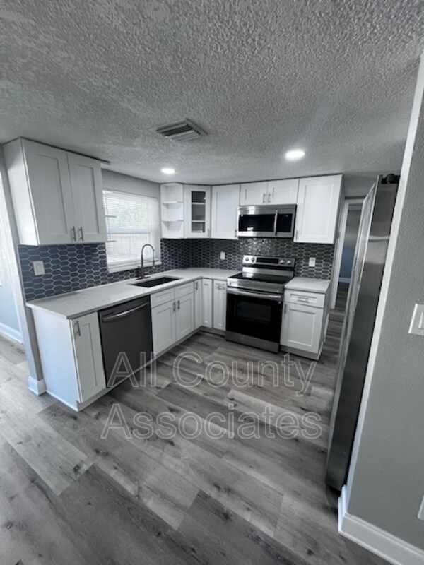 Foto del edificio - 7821 Flintlock Dr