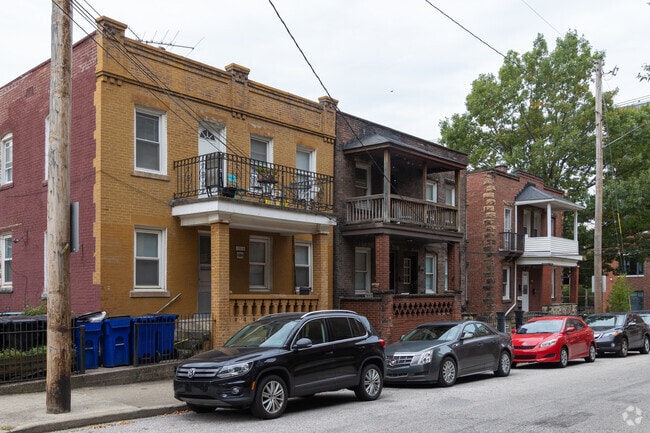 A historic row of brownstone multi-family homes line the streets in Cleveland Heights.