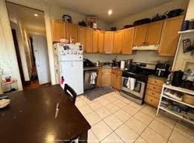 Building Photo - Renovated 5-bedroom duplex just outside Brigham Circle!, In-Unit Laundry, Porch