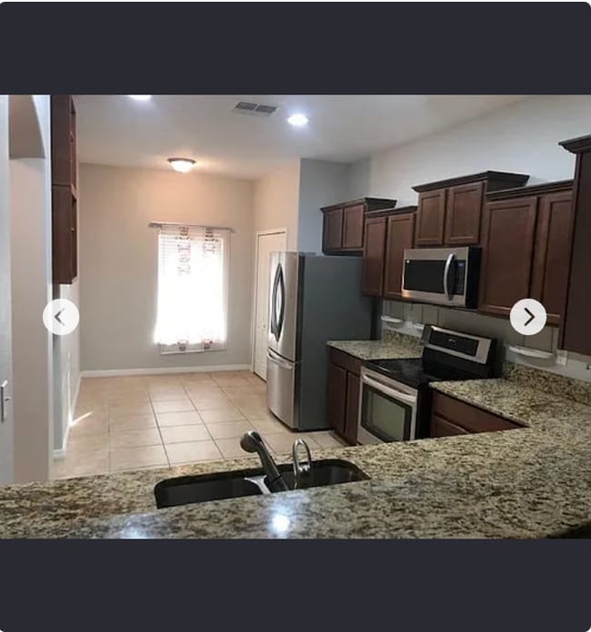 Building Photo - 4142 Shadetree Ln