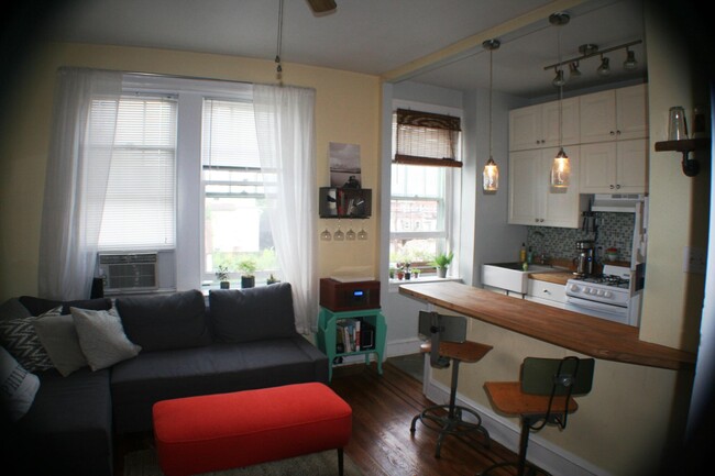 Living room open to galley kitchen - 7101 Emlen St