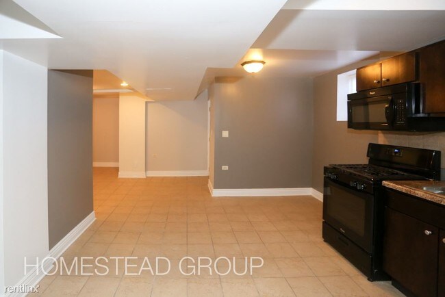 Foto del edificio - 4708 N Lowell Ave