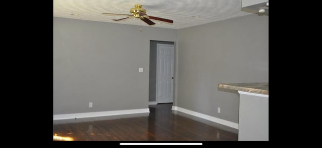 Older photo of living room due to current tenants privacy - 8803 Chesapeake Blvd