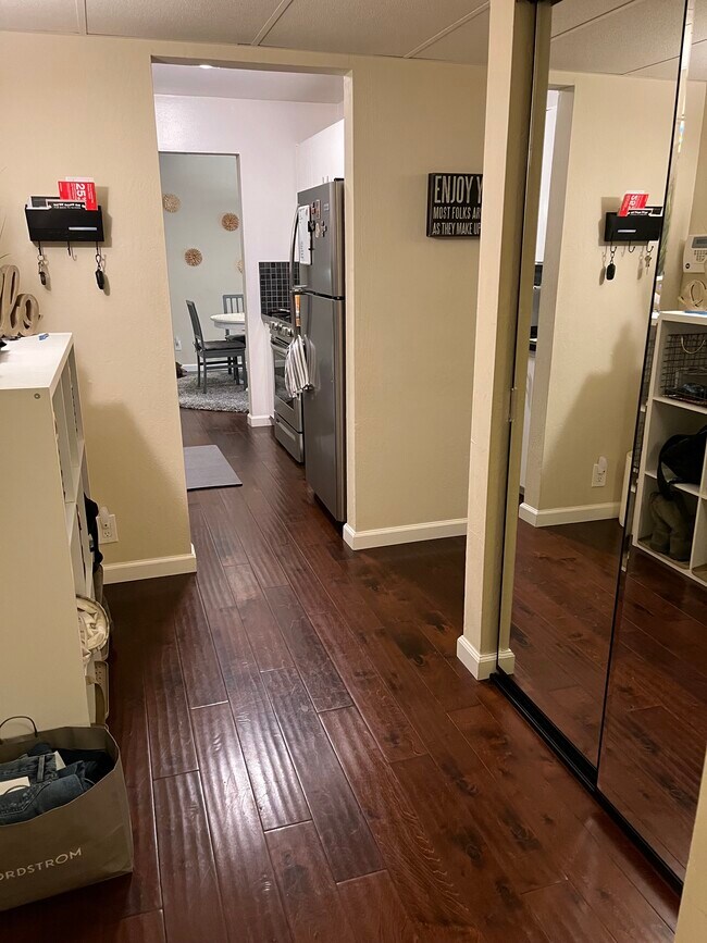 entry way with mirrored hall closet - 330 N Civic Dr