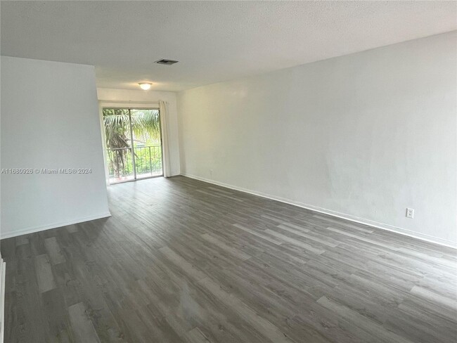 Building Photo - 3090 Coral Springs Dr