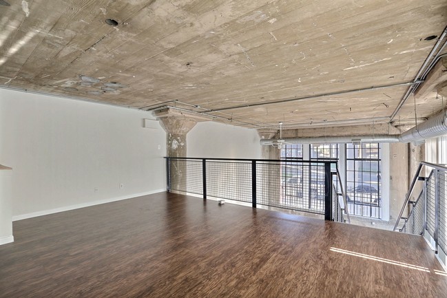 The Mezzanine Area is spacious with lots of natural lighting - Adam Hats Lofts