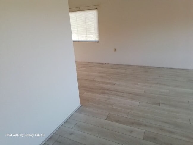Building Photo - Unfurnished end unit townhome  55 and older community