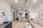 Located at 8340 Picardy Ave in Baton Rouge, LA, this thoughtfully designed one-bedroom, one-bathroom unit offers an efficient and modern living experience across a single floor. The open-concept layout seamlessly connects the living, dining, and kitchen areas, creating a cohesive and airy space bathed in recessed lighting and natural light.

The kitchen is a standout feature, showcasing gray shaker cabinetry, granite countertops, a large central island with an undermount sink and bar seating, and a full suite of stainless steel appliances. Light wood-look flooring runs throughout the main living areas, enhancing the clean, contemporary aesthetic.

The living room is warm and inviting, anchored by a ceiling fan and French doors that bring in natural light and provide outdoor access. Three closets offer generous storage throughout the unit, while a dedicated laundry area adds everyday convenience.

The bedroom is a comfortable retreat with large windows, a ceiling fan, and ample natural light. The full bathroom features a soaking tub, subway tile surround, matte black fixtures, and a granite-topped vanity. With its modern finishes, practical layout, and bright, neutral palette, this unit delivers a refined and functional living environment.