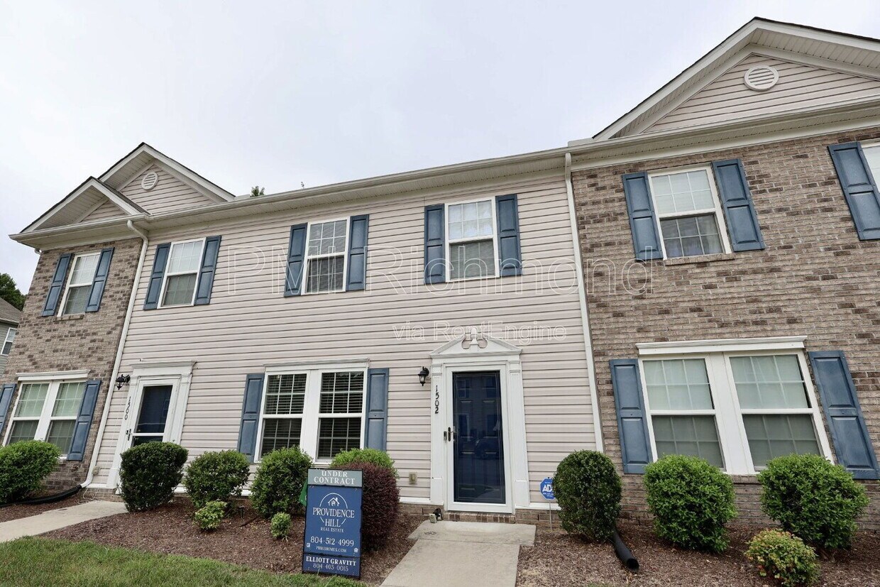 Foto principal - 1502 Stonewall Manor Dr