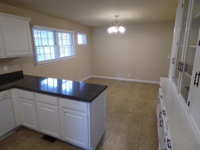 Building Photo - All Brick 3BR Home with Fenced Back Yard