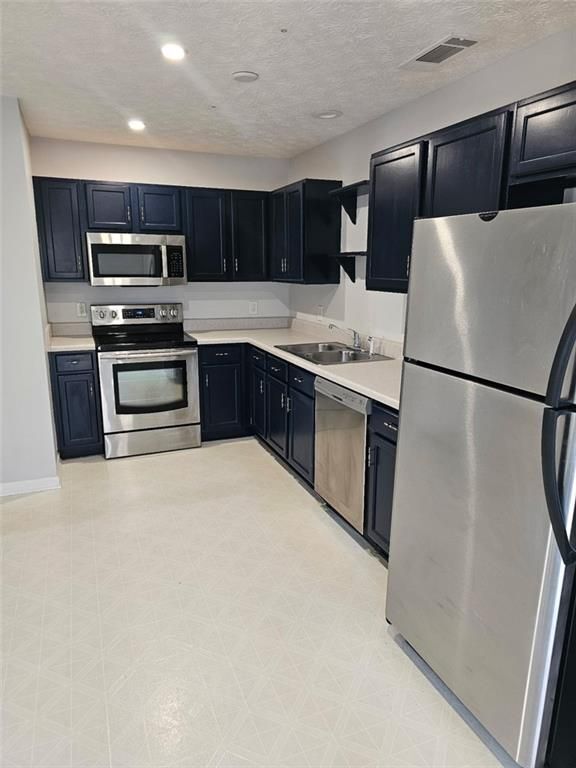 Building Photo - 5425 Village Green Square