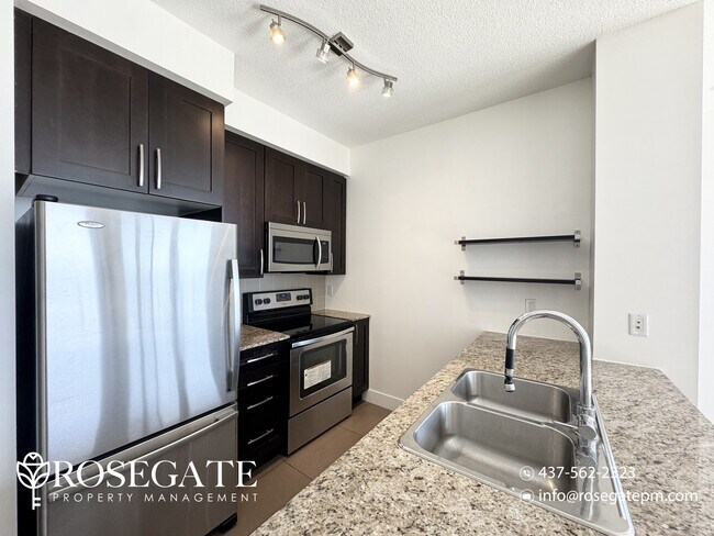 Building Photo - Newly Renovated 2-Bedroom Corner Condo wit...