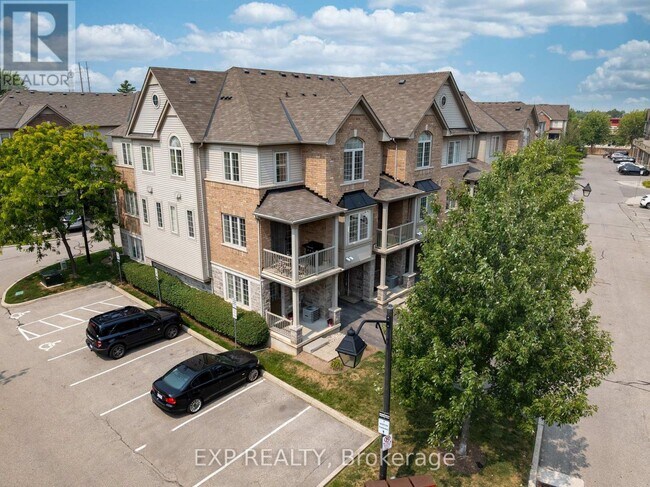 Photo du bâtiment - 1401-1401 Plains Rd E
