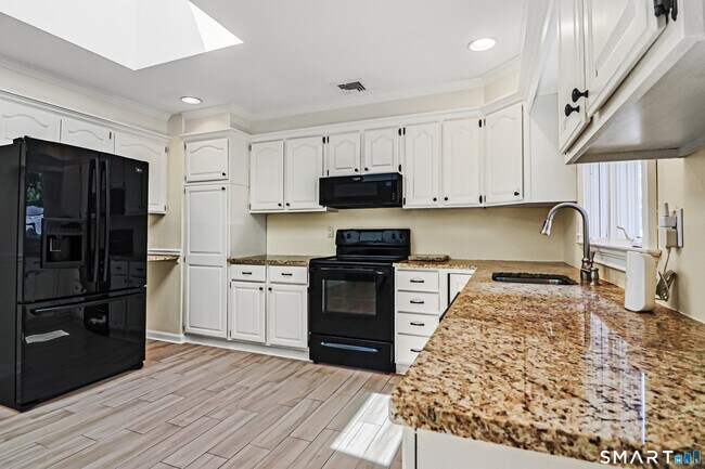 Foto del edificio - 8 Woodchuck Ct