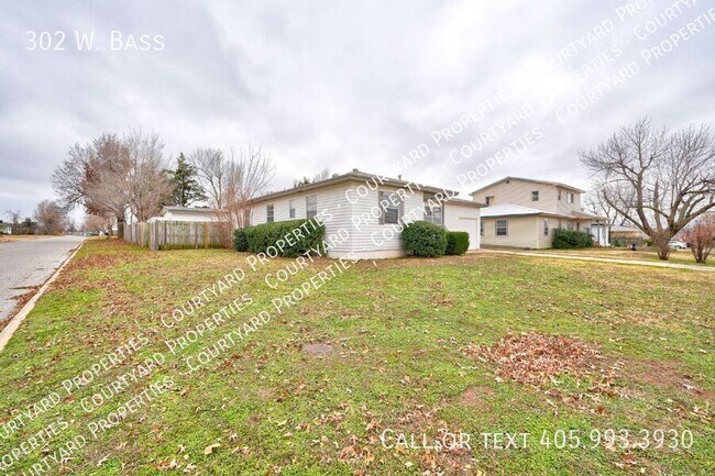 Building Photo - 302 W. Bass-