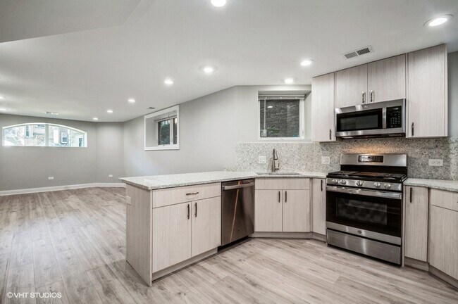 Foto del edificio - 5915 N Artesian Ave