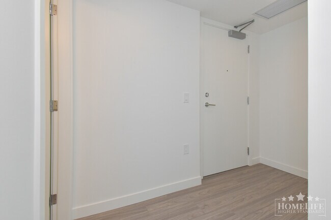 Building Photo - Modern 1 Bedroom Plus Den at The Flamingo ...