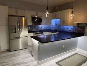 Building Photo - 3572 W 66th Ave