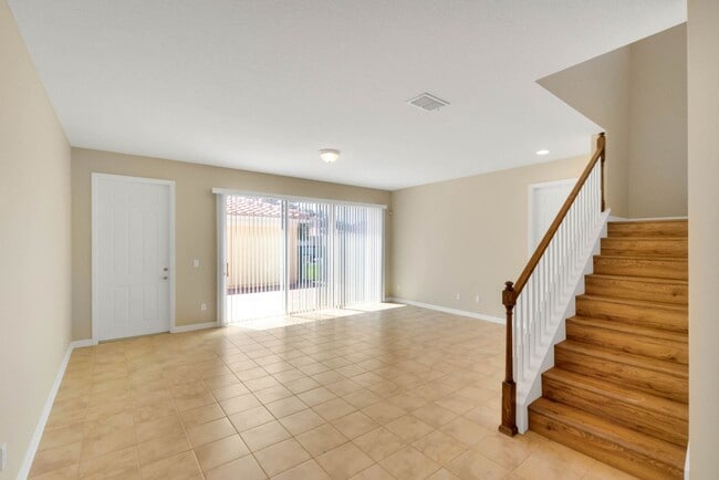 Building Photo - Beautiful 3/3/2 in Gated Amenity Rich Vill...