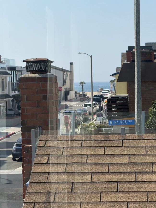 Ocean view from living room. Cool ocean breeze from Dutch door. - 209 39th St