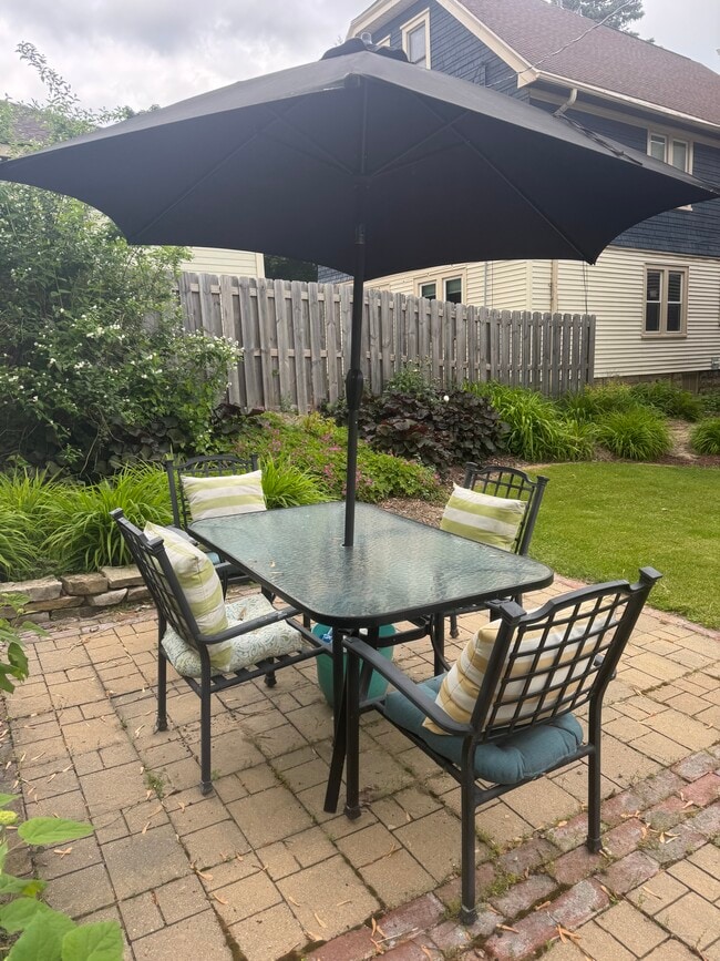 Patio with table and chairs! - 6821 W Lloyd St