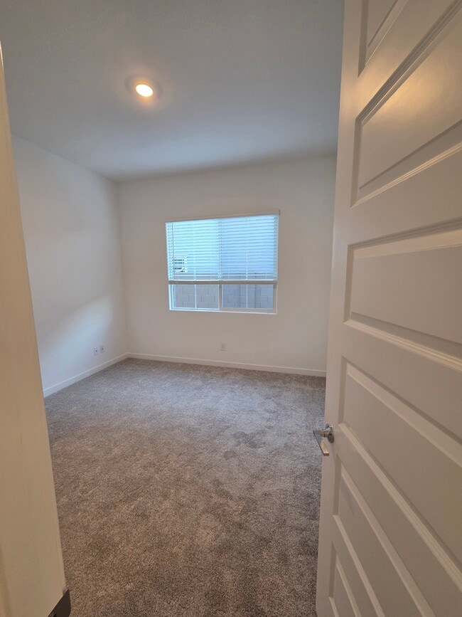 Building Photo - 23104 E Roundup Way